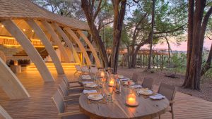guest-area-dining-at-andBeyond-sandibe-on-a-luxury-botswana-safari-overlooking-the-okavango-delta